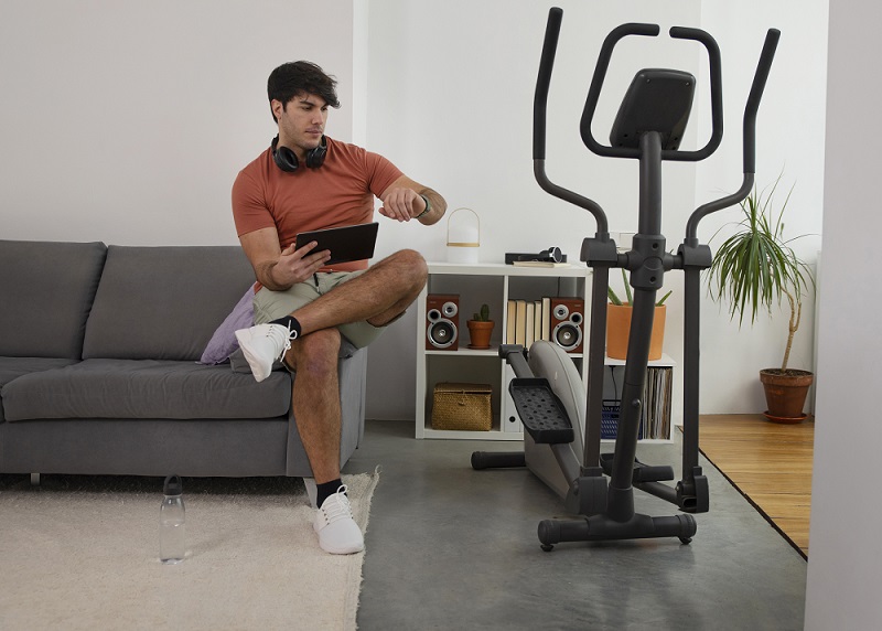 person-doing-in-house-gym-using-app